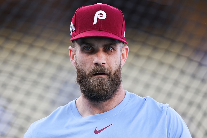 Oct 8, 2025; Los Angeles, California, USA; Philadelphia Phillies first baseman Bryce Harper (3) looks on during warms up before the game against the Los Angeles Dodgers during game three of the NLDS round for the 2025 MLB playoffs at Dodger Stadium. Mandatory Credit: Kiyoshi Mio-Imagn Images