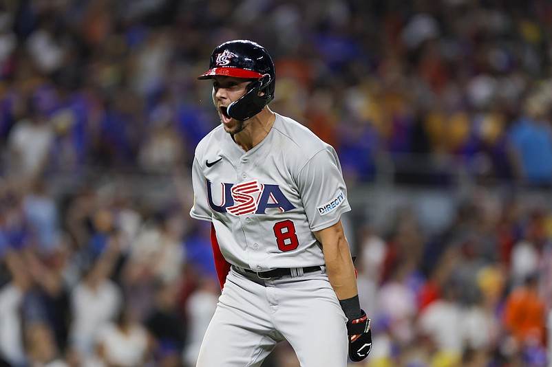 Mar 18, 2023; Miami, Florida, USA; USA shortstop Trea Turner (8) reacts after hitting a grand slam during the eighth inning against Venezuela at LoanDepot Park. Mandatory Credit: Sam Navarro-USA TODAY Sports