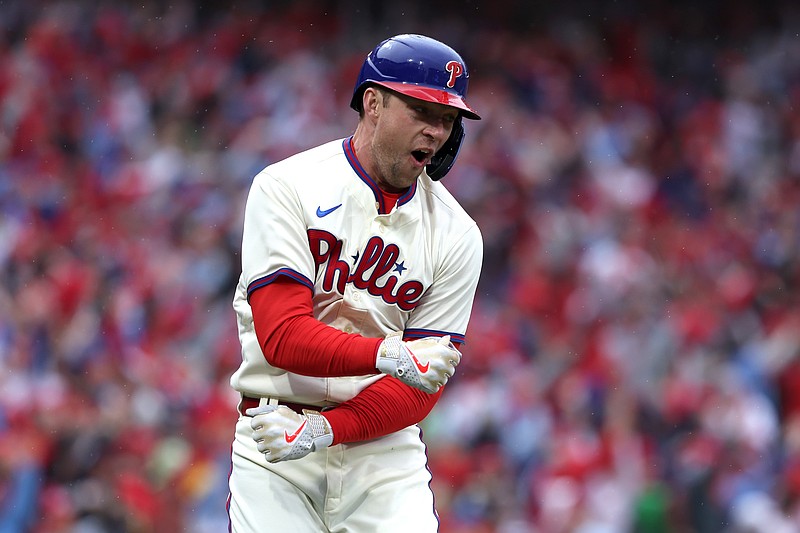Oct 23, 2022; Philadelphia, Pennsylvania, USA; Philadelphia Phillies first baseman Rhys Hoskins (17) reacts after hitting a two-run home run in the third inning during game five of the NLCS against the San Diego Padres for the 2022 MLB Playoffs at Citizens Bank Park. Mandatory Credit: Bill Streicher-USA TODAY Sports