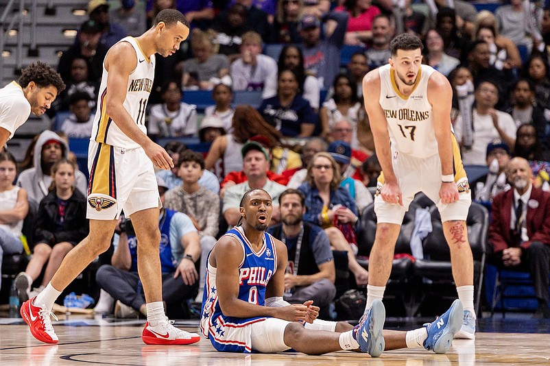 Feb 21, 2026; New Orleans, Louisiana, USA;  Philadelphia 76ers guard Tyrese Maxey (0) reacts to a play against New Orleans Pelicans forward/center Karlo MatkoviÄ‡ (17) and guard Bryce McGowens (11) during the second half at Smoothie King Center. Mandatory Credit: Stephen Lew-Imagn Images
