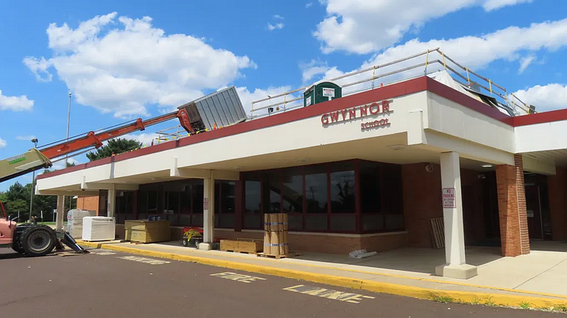Construction equipment can be seen stationed atop the roof of Gwyn Nor Elementary School in Upper Gwynedd, while workers take a lunch break, on Wednesday August 2 2023.