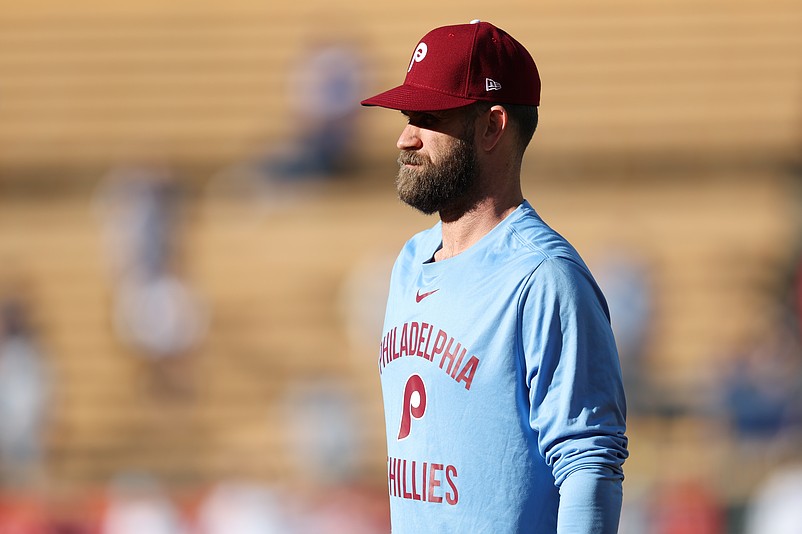 Oct 8, 2025; Los Angeles, California, USA; Philadelphia Phillies first baseman Bryce Harper (3) looks on during warms up before the game against the Los Angeles Dodgers during game three of the NLDS round for the 2025 MLB playoffs at Dodger Stadium. Mandatory Credit: Kiyoshi Mio-Imagn Images