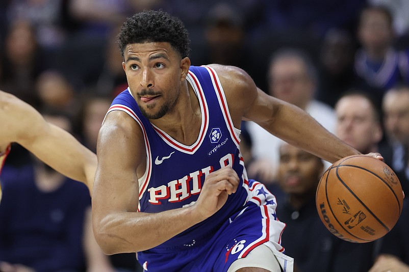 Feb 19, 2026; Philadelphia, Pennsylvania, USA; Philadelphia 76ers guard Quentin Grimes (5) drives against the Atlanta Hawks during the fourth quarter at Xfinity Mobile Arena. Mandatory Credit: Bill Streicher-Imagn Images