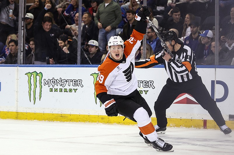 Feb 26, 2026; New York, New York, USA;  Philadelphia Flyers right wing Matvei Michkov (39) celebrates after scoring a the game winning goal in overtime against the New York Rangers at Madison Square Garden. Mandatory Credit: Wendell Cruz-Imagn Images
