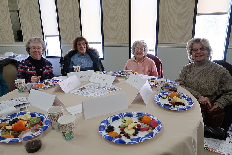 From left, Lynne Walters, Beverly Schechtman, Shirley Belitsky and Fran Cavallavo joined nearly 30 people at the Tu B’Shevat community seder lunch held at Shirat Hayam Synagogue Feb. 2.