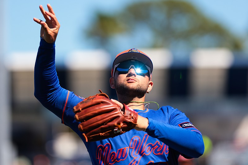 Feb 24, 2026; Port St. Lucie, Florida, USA; New York Mets third baseman Bo Bichette (19) throws a baseball into the stands against the Houston Astros during the first inning at Clover Park. Mandatory Credit: Sam Navarro-Imagn Images