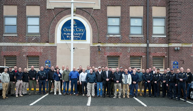 Police and city officials stand outside the old public safety building to mark its closing. (Photo courtesy of Ocean City)