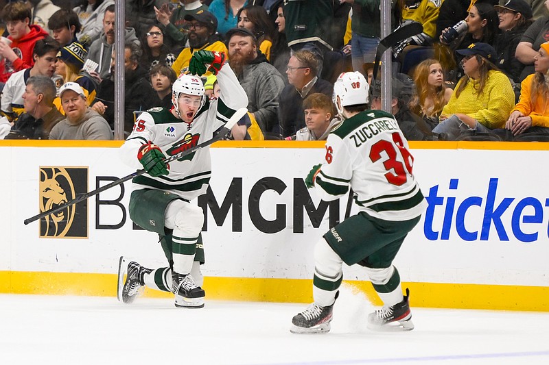 Jan 18, 2025; Nashville, Tennessee, USA;  Minnesota Wild defenseman David Jiricek (55) celebrates his goal against the Nashville Predators during the first period at Bridgestone Arena. Mandatory Credit: Steve Roberts-Imagn Images
