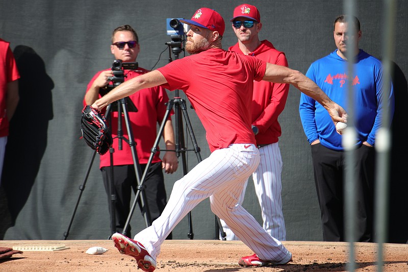 March 7, 2026; Clearwater, Florida, USA; Philadelphia Phillies pitcher Zack Wheeler throws a bullpen session as he recovers from thoracic outlet syndrome. (Grace Del Pizzo/On Pattison)