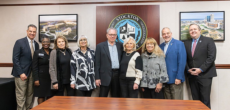 From left, Michael Palladino, Stockton provost and vice president for Academic Affairs; Terricita Sass, Stockton executive vice president and chief of staff; Friends of Encore Learning at Stockton board members Toby Tessler, Sondra Mandel, Jim Cahill and Arlene Halpern; FELS President Meryl Baer; Stockton President Joe Bertolino; and Dan Nugent, Stockton vice president of Advancement and executive director of the Stockton Foundation.