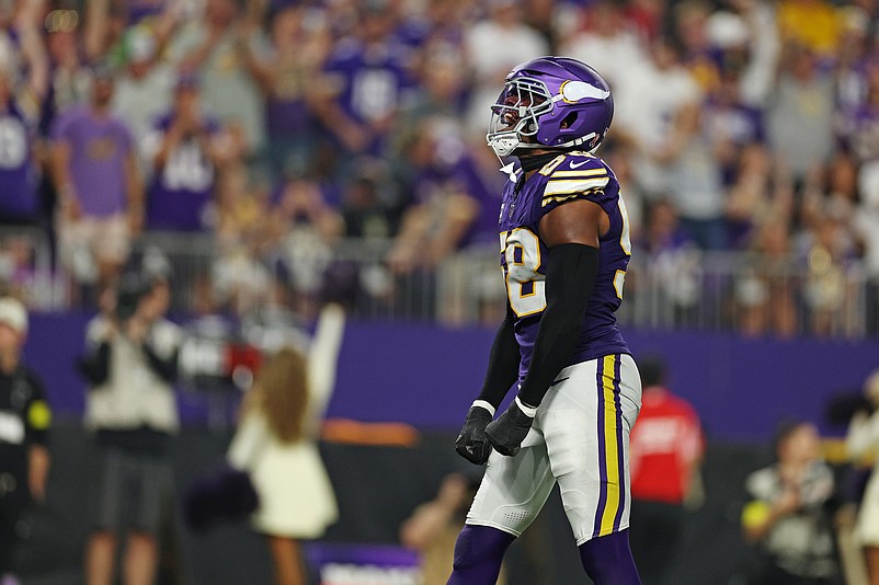 Sep 14, 2025; Minneapolis, Minnesota, USA; Minnesota Vikings linebacker Jonathan Greenard (58) celebrates a sack during the second half against the Atlanta Falcons at U.S. Bank Stadium. Mandatory Credit: Matt Krohn-Imagn Images