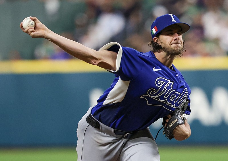 Mar 11, 2026; Houston, TX, United States; Italy starting pitcher Aaron Nola (27) pitches against Mexico  in the fifth inning at Daikin Park. Mandatory Credit: Thomas Shea-Imagn Images