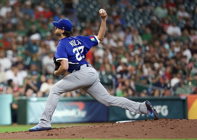 Mar 11, 2026; Houston, TX, United States; Italy starting pitcher Aaron Nola (27) pitches against Mexico in the first inning  at Daikin Park. Mandatory Credit: Thomas Shea-Imagn Images