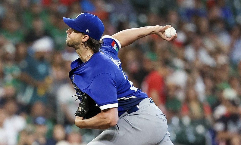 Mar 11, 2026; Houston, TX, United States; Italy starting pitcher Aaron Nola (27) pitches against Mexico in the first inning  at Daikin Park. Mandatory Credit: Thomas Shea-Imagn Images