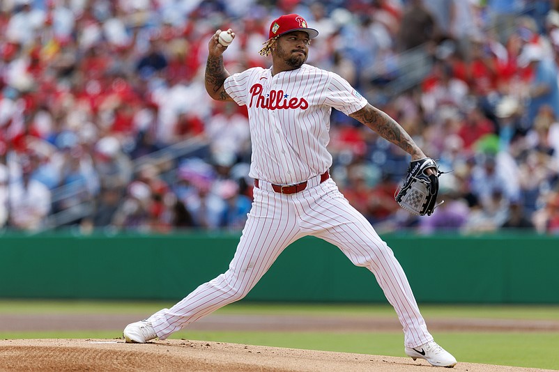 Mar 15, 2026; Clearwater, Florida, USA; Philadelphia Phillies starting pitcher Taijuan Walker (99) throws a pitch against the Atlanta Braves in the first inning during spring training at BayCare Ballpark. Mandatory Credit: Nathan Ray Seebeck-Imagn Images