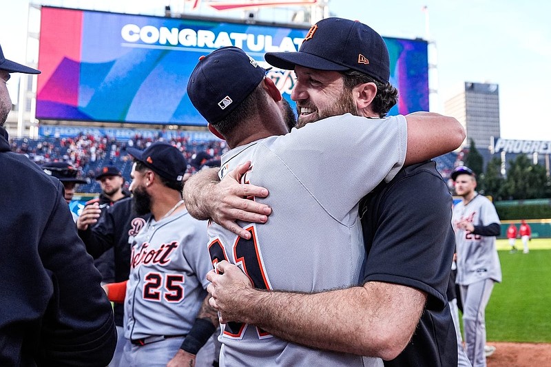 Detroit Tigers pitcher Casey Mize (12) hugs, left fielder Riley Greene (31) to celebrates 6-3 win over Cleveland Guardians in Game 3 of AL wild-card series at Progressive Field in Cleveland on Thursday, Oct. 2, 2025.