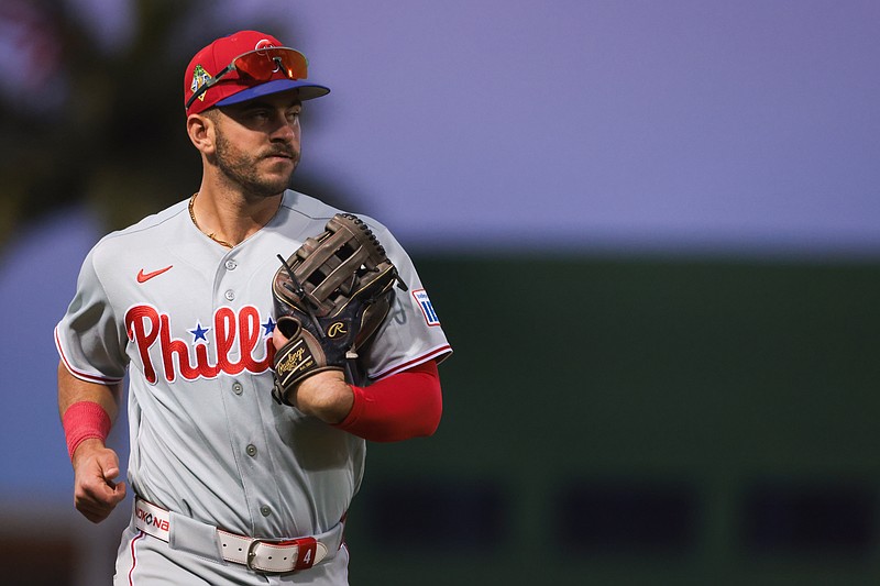 Feb 22, 2026; West Palm Beach, Florida, USA; Philadelphia Phillies first baseman Otto Kemp (4) returns to the dugout against the Washington Nationals during the first inning at CACTI Park of the Palm Beaches. Mandatory Credit: Sam Navarro-Imagn Images