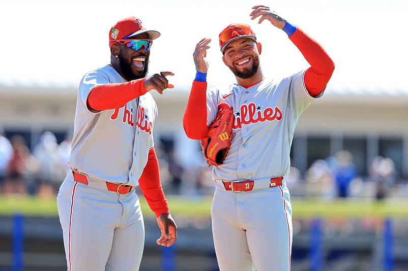Philadelphia Phillies outfielder Adolis Garcia (53) and infielder Edmundo Sosa (33) smile during the fourth inning against the Toronto Blue Jays at TD Ballpark.
Kim Klement Neitzel-Imagn Images
