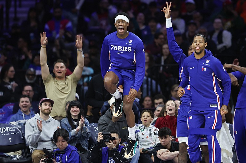 Mar 25, 2026; Philadelphia, Pennsylvania, USA; Philadelphia 76ers guard Vj Edgecombe reacts to a Paul George (not pictured) three pointer against the Chicago Bulls during the fourth quarter at Xfinity Mobile Arena. Mandatory Credit: Bill Streicher-Imagn Images