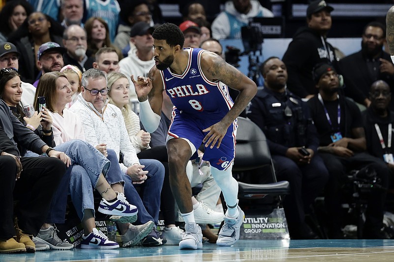 Mar 28, 2026; Charlotte, North Carolina, USA; Philadelphia 76ers forward Paul George (8) celebrates after making a basket during the fourth quarter against the Charlotte Hornets at Spectrum Center. Mandatory Credit: Brian Westerholt-Imagn Images