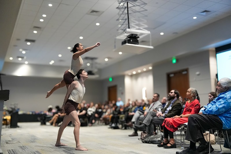 Stockton students Shanna Landestoy and Jackson O'Brien perform 'Moth to a Flame' at the 2025 summit. (Stockton University)