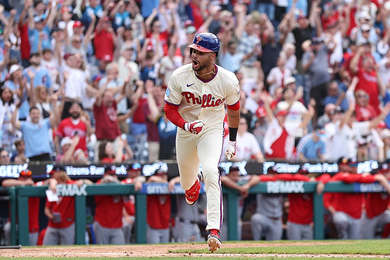 Apr 1, 2026; Philadelphia, Pennsylvania, USA; Philadelphia Phillies center fielder Justin Crawford (2) reacts as he hits a walk off game winning RBI single during the tenth inning against the Washington Nationals at Citizens Bank Park. Mandatory Credit: Bill Streicher-Imagn Images