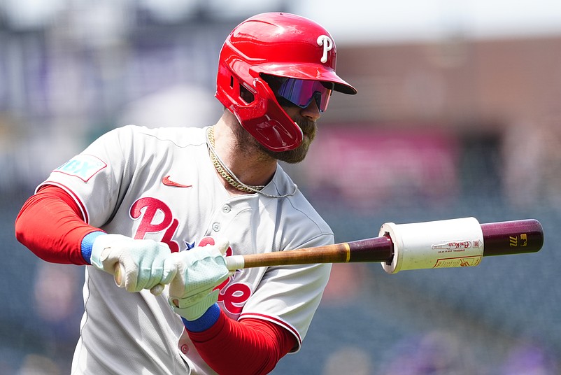 May 22, 2025; Denver, Colorado, USA; Philadelphia Phillies first baseman Bryce Harper (3) on deck to bat during the first inning against the Colorado Rockies at Coors Field. Mandatory Credit: Ron Chenoy-Imagn Images