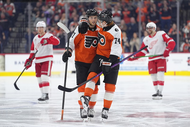 Apr 2, 2026; Philadelphia, Pennsylvania, USA; Philadelphia Flyers right wing Tyson Foerster (71) reacts with right wing Owen Tippett (74) after scoring a goal against the Detroit Red Wings in the second period at Xfinity Mobile Arena. Mandatory Credit: Kyle Ross-Imagn Images