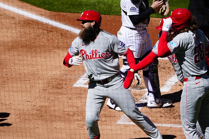 Apr 3, 2026; Denver, Colorado, USA; Philadelphia Phillies center fielder Brandon Marsh (16) celebrates his three run home run during the first inning against the Colorado Rockies at Coors Field. Mandatory Credit: Ron Chenoy-Imagn Images