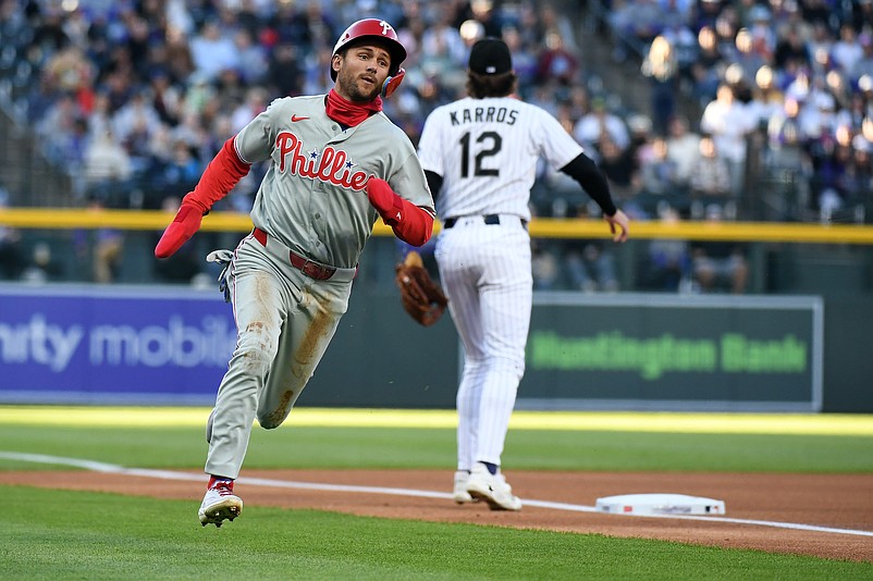 Apr 4, 2026; Denver, Colorado, USA; Philadelphia Phillies infielder Trea Turner (7) rounds third to score during the first inning against the Colorado Rockies at Coors Field. Mandatory Credit: Christopher Hanewinckel-Imagn Images