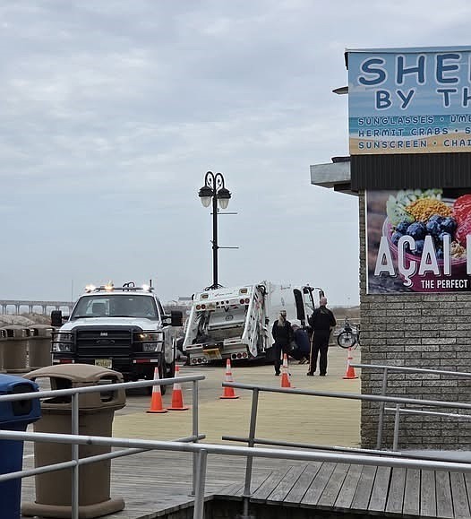 A Facebook photo shows the trash truck on the damaged part of the Boardwalk. (Courtesy of Michael J. Phillips II)