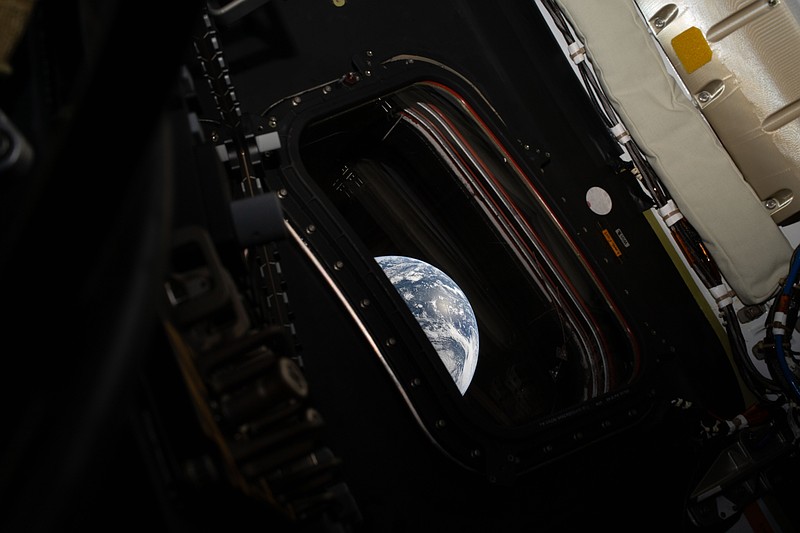 Artemis II Looking Back at Earth. Photo by Reid Wiseman | NASA.