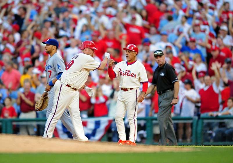 Oct  10, 2008; Philadelphia, PA, USA; Philadelphia Phillies pitcher Brett Myers celebrates with first base coach Davey Lopes after hitting a single driving in two runs in the third inning against the Los Angeles Dodgers during game two of the NLCS at Citizens Bank Park.  Mandatory Credit: James Lang-USA TODAY Sports