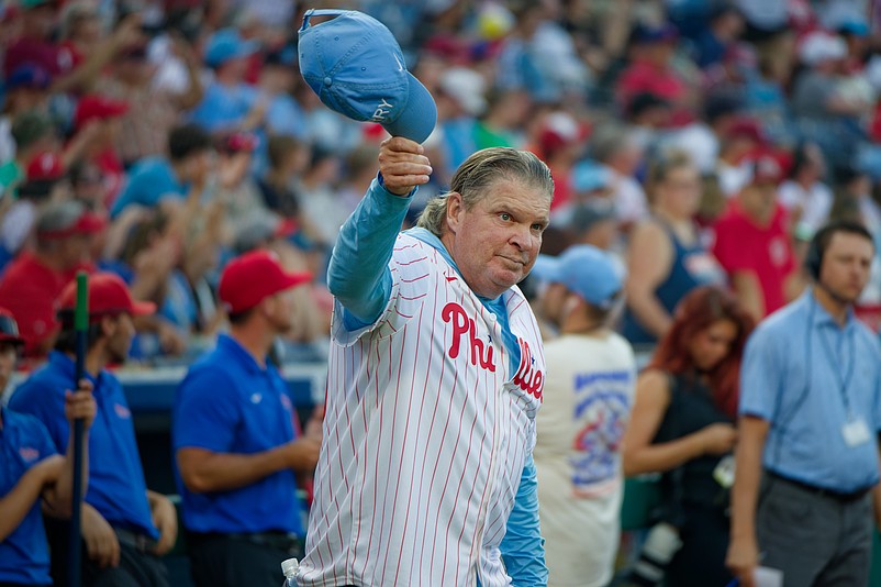 Aug 3, 2025; Philadelphia, Pennsylvania, USA; Phillies Wall of Famer John Kruk salutes the crowd during Toyota Phillies Alumni Night at Citizens Bank Park. (Grace Del Pizzo/On Pattison)