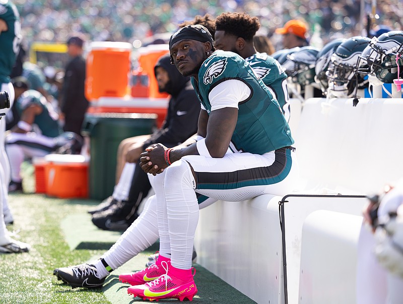 Oct 13, 2024; Philadelphia, Pennsylvania, USA; Philadelphia Eagles wide receiver A.J. Brown (11) sits on the players bench before entering the game during the first quarter against the Cleveland Browns at Lincoln Financial Field. Mandatory Credit: Bill Streicher-Imagn Images