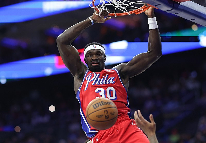 Apr 3, 2026; Philadelphia, Pennsylvania, USA; Philadelphia 76ers center Adem Bona (30) dunks the ball against the Minnesota Timberwolves during the second quarter at Xfinity Mobile Arena. Mandatory Credit: Bill Streicher-Imagn Images
