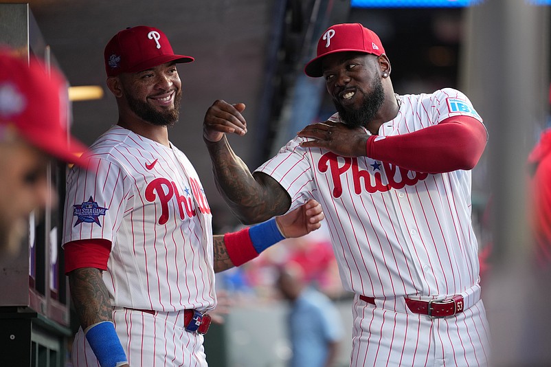 Apr 14, 2026; Philadelphia, Pennsylvania, USA; Philadelphia Phillies outfielder Adolis Garcia (53) reacts with infielder Edmundo Sosa (33) before the game against the Chicago Cubs at Citizens Bank Park. Mandatory Credit: Kyle Ross-Imagn Images