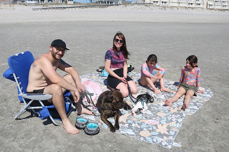 The Gablin family of Swedesboro, N.J., enjoys a gorgeous spring day at the Sea Isle City beach.