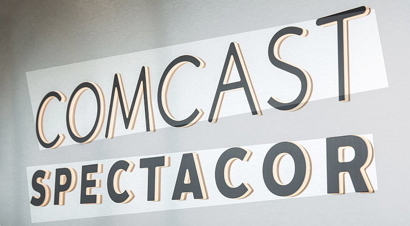 Comcast Spectacor logo.