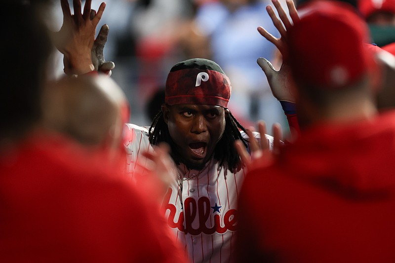 Apr 18, 2026; Philadelphia, Pennsylvania, USA; Philadelphia Phillies outfielder Felix Reyes (29) celebrates in the dugout after hitting a home run in his first major league at bat during the second inning against the Atlanta Braves at Citizens Bank Park. Mandatory Credit: Bill Streicher-Imagn Images