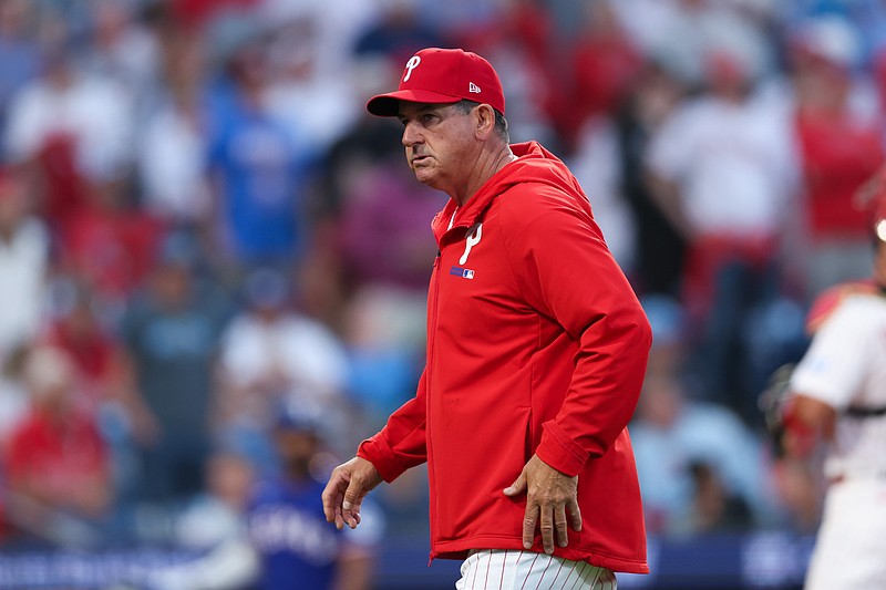 Mar 26, 2026; Philadelphia, Pennsylvania, USA;  Philadelphia Phillies manager Rob Thomson walks back to the dugout after a pitching change during the ninth inning against the Texas Rangers at Citizens Bank Park. Mandatory Credit: Bill Streicher-Imagn Images