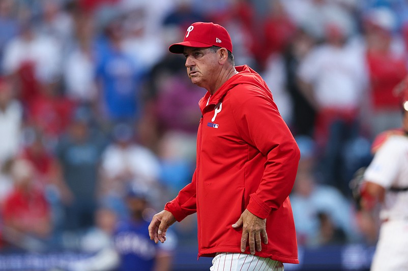 Mar 26, 2026; Philadelphia, Pennsylvania, USA;  Philadelphia Phillies manager Rob Thomson walks back to the dugout after a pitching change during the ninth inning against the Texas Rangers at Citizens Bank Park. Mandatory Credit: Bill Streicher-Imagn Images