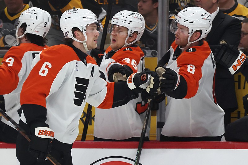 Apr 18, 2026; Pittsburgh, Pennsylvania, USA; Philadelphia Flyers defenseman Travis Sanheim (6) celebrates his goal with the Flyers bench against the Pittsburgh Penguins during the third period in game one of the first round of the 2026 Stanley Cup Playoffs at PPG Paints Arena. Mandatory Credit: Charles LeClaire-Imagn Images