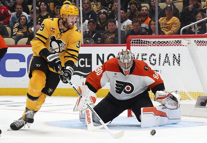 Apr 20, 2026; Pittsburgh, Pennsylvania, USA;  Philadelphia Flyers goaltender Dan Vladar (80) defends the net against  Pittsburgh Penguins right wing Anthony Mantha (39) during the third period in game two of the first round of the 2026 Stanley Cup Playoffs at PPG Paints Arena. Mandatory Credit: Charles LeClaire-Imagn Images