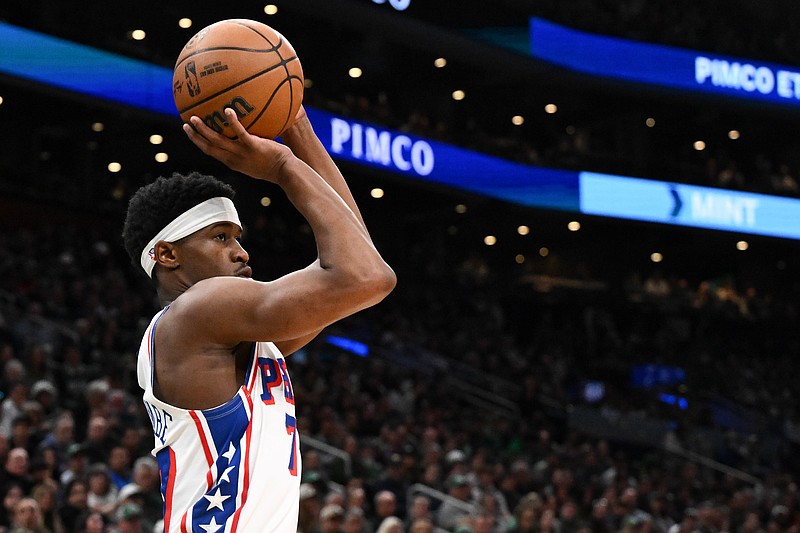 Apr 21, 2026; Boston, Massachusetts, USA; Philadelphia 76ers guard Vj Edgecombe (77) attempts a three-point basket against the Boston Celtics in the first half of a game two of the first round of the 2026 NBA Playoffs at TD Garden. Mandatory Credit: Brian Fluharty-Imagn Images