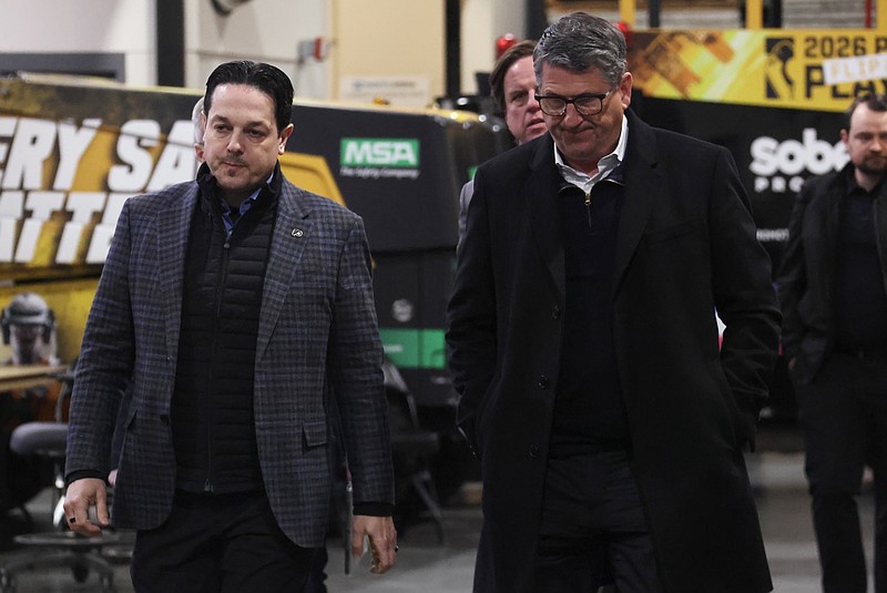 Apr 20, 2026; Pittsburgh, Pennsylvania, USA;  Philadelphia Flyers General Manager Danny Briere (left) and President of Hockey Operations Keith Jones (right) after the Flyers defeated the Pittsburgh Penguins in game two of the first round of the 2026 Stanley Cup Playoffs at PPG Paints Arena. Mandatory Credit: Charles LeClaire-Imagn Images