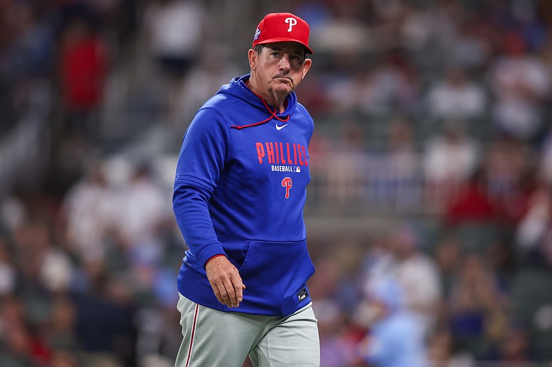 Apr 25, 2026; Atlanta, Georgia, USA; Philadelphia Phillies head coach Rob Thomson (49) makes a pitching change against the Atlanta Braves in the sixth inning at Truist Park. Mandatory Credit: Brett Davis-Imagn Images