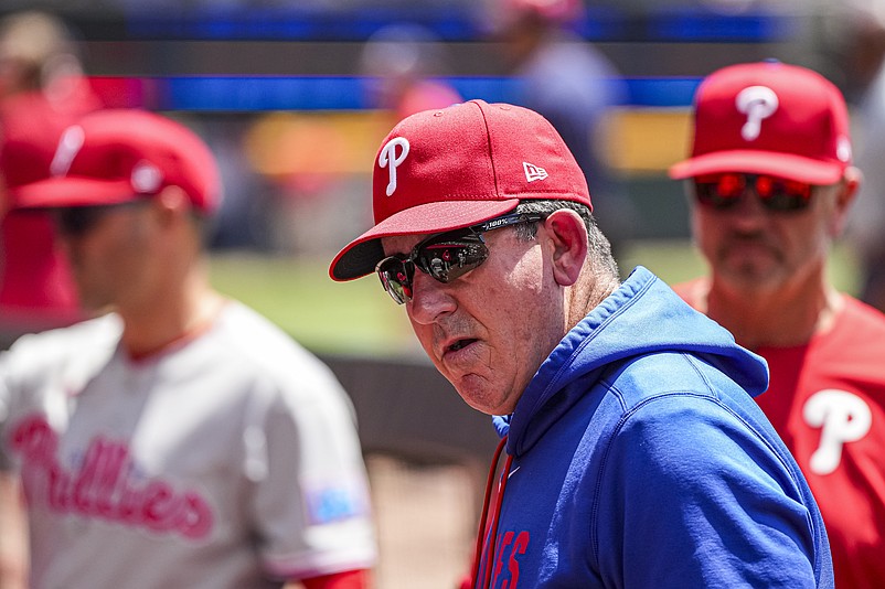 Apr 26, 2026; Cumberland, Georgia, USA; Philadelphia Phillies manager Rob Thomson (49) in the dugout during the game against the Atlanta Braves at Truist Park. Mandatory Credit: Dale Zanine-Imagn Images