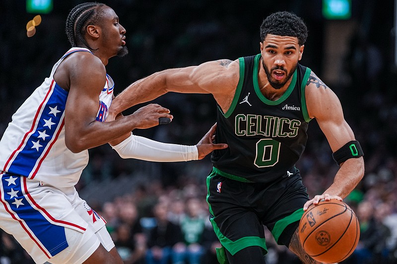 Apr 28, 2026; Boston, Massachusetts, USA; Boston Celtics forward Jayson Tatum (0) drives the ball against Philadelphia 76ers guard Tyrese Maxey (0) in the second half during game five of the first round of the 2026 NBA Playoffs at TD Garden. Mandatory Credit: David Butler II-Imagn Images
