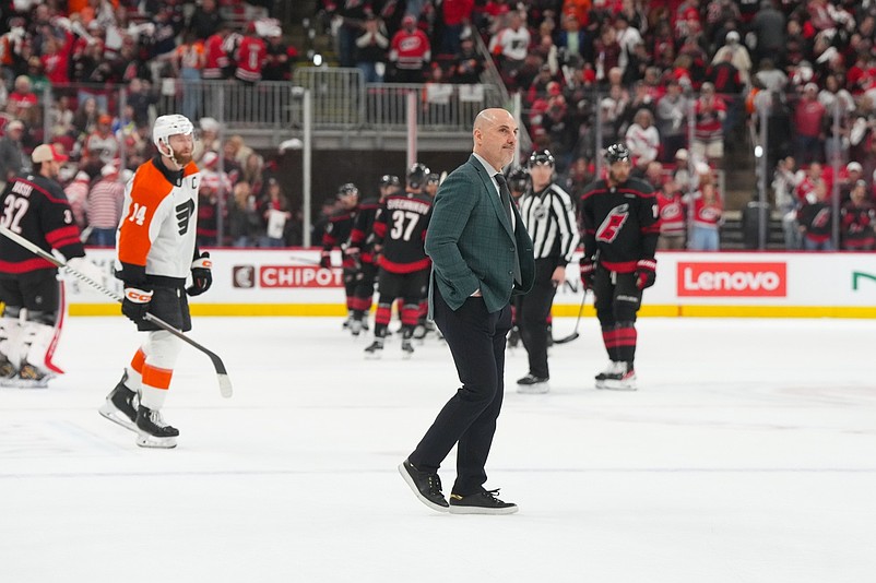 May 2, 2026; Raleigh, North Carolina, USA; Philadelphia Flyers head coach Rick Tocchet walk off the ice after their loss to the Carolina Hurricanes at Lenovo Center. Mandatory Credit: James Guillory-Imagn Images